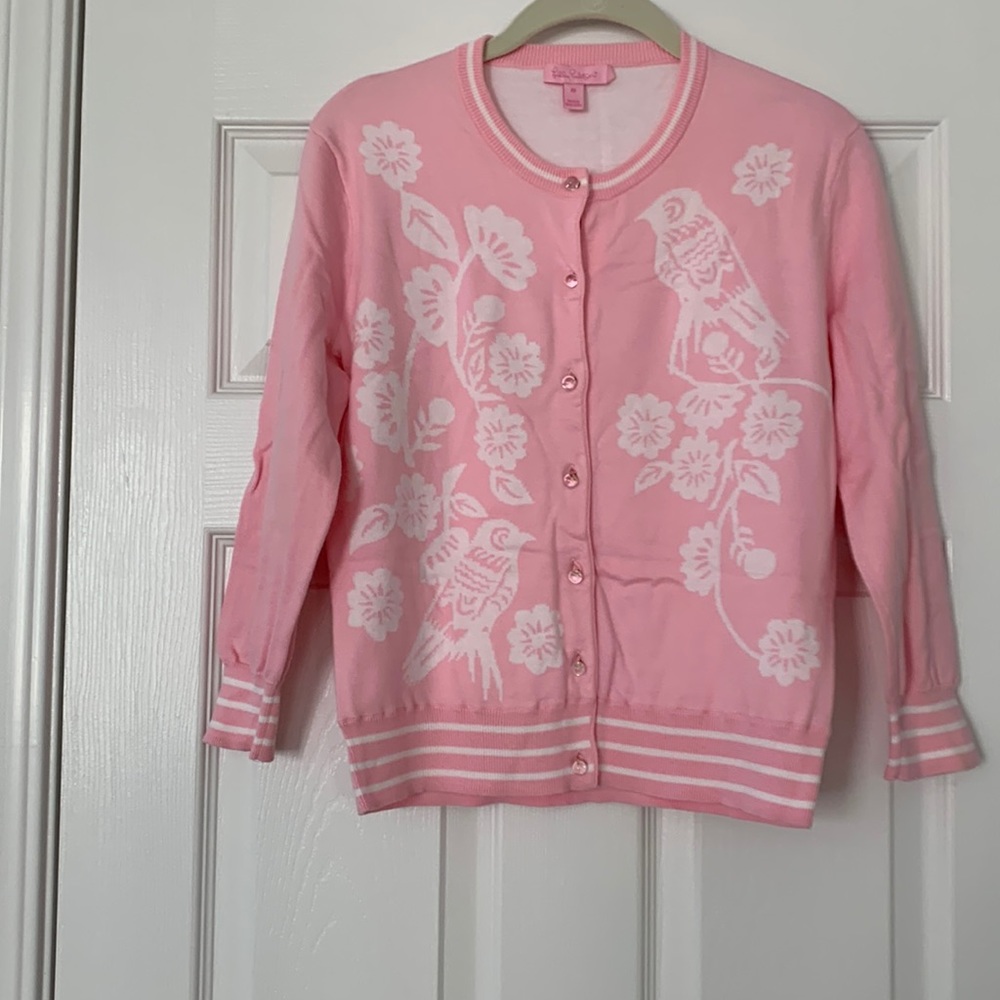 Beautiful Lily Pulitzer Sweater Pink with white background.